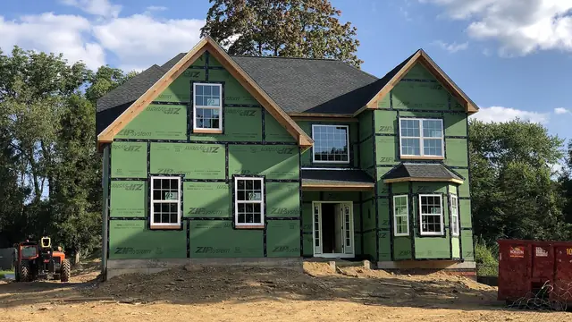 Framing work: 2024-08-23 17 17 14 A new wood-frame house being built along Perry Drive in the Mountainview section of Ewing Township, Mercer County, New Jersey